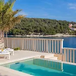 Luxury Seafront White Sparkle Brac With Heated Pool