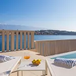 Luxury Seafront White Sparkle Brac With Heated Pool