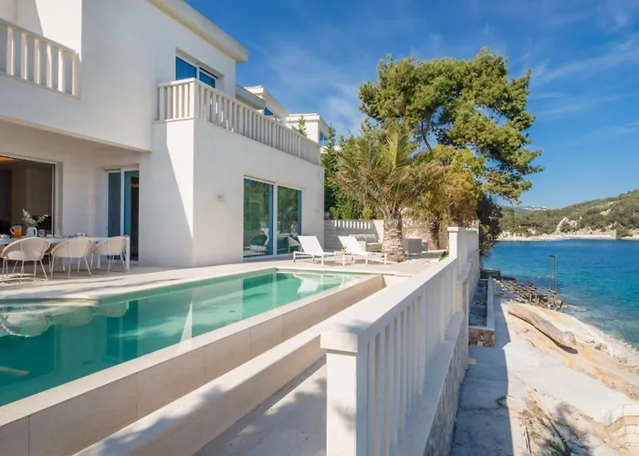 Luxury Seafront White Sparkle Brac With Heated Pool