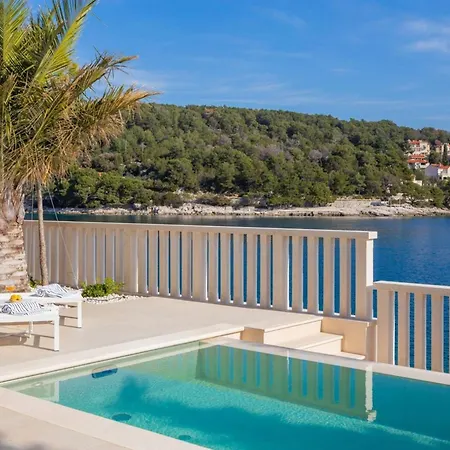 Luxury Seafront White Sparkle Brac With Heated Pool