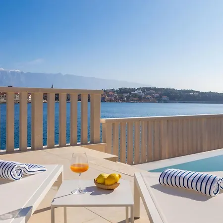 Luxury Seafront White Sparkle Brac With Heated Pool